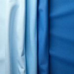 A comparison layout showing different thread counts with fabric samples of sapphire sheets