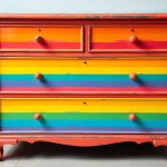 freepik__colorful-dresser-with-each-drawer-painted-in-brigh__82111