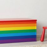 freepik__kids-room-with-rainbow-striped-toy-chest-and-multi__82115