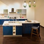 modern kitchen featuring patterned tile flooring with a cohesive color scheme that complements the cabinetry