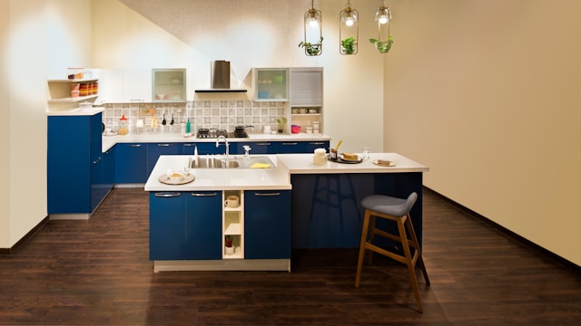 modern kitchen featuring patterned tile flooring with a cohesive color scheme that complements the cabinetry