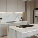 A sleek modern kitchen with smart appliances — induction cooktop, built-in oven, and stainless steel refrigerator — showing high-end functionality.