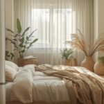 A calm, beautifully lit bedroom with soft natural colours, layered textures, and plants — a space that visibly promotes rest and mental calm. Warm morning light.