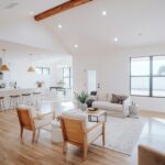 Modern home interior with layered lighting and neutral colors
