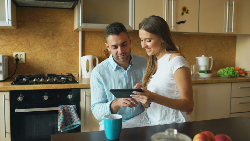 Contractor and homeowner reviewing renovation plans