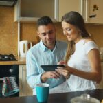 Contractor and homeowner reviewing renovation plans