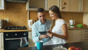 Contractor and homeowner reviewing renovation plans