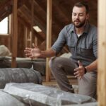 Professional demonstrating home insulation tips for better energy savings technique