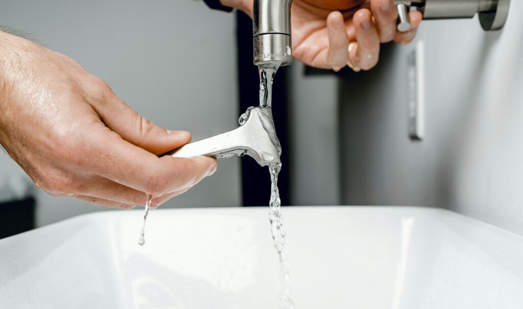 Fixing a leaky faucet with basic tools